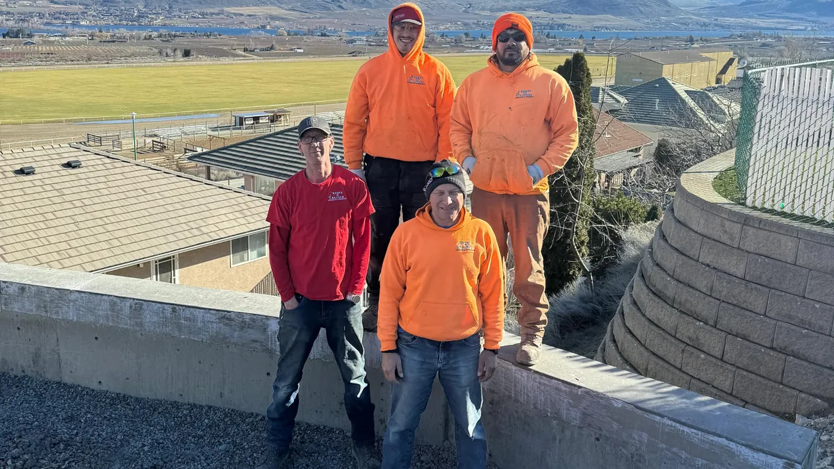 The Rocks N Blocks landscaping crew on a retaining wall project site in the South Okanagan